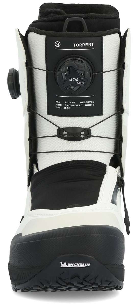 Ride Torrent Snowboard Boots 2024 - Black snowboard boots with white accents and a black strap on top.