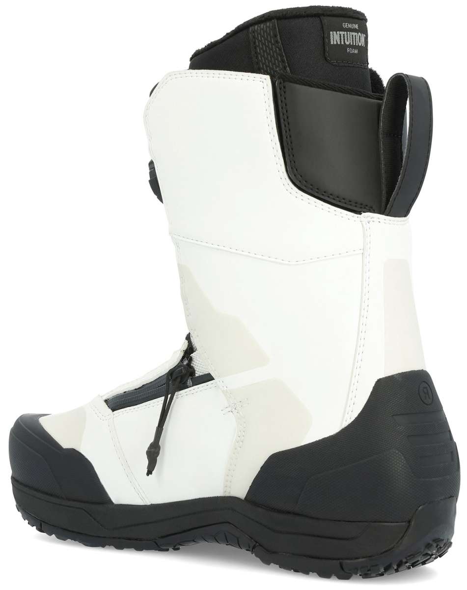 Ride Torrent Snowboard Boots 2024 - A pair of white snowboard boots with black accents and laces, featuring a textured rubber toe cap.