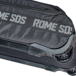 Rome Escort Wheelie Board Bag 2023 - Black bag with zippered top and handle on top, lying flat on a white background.