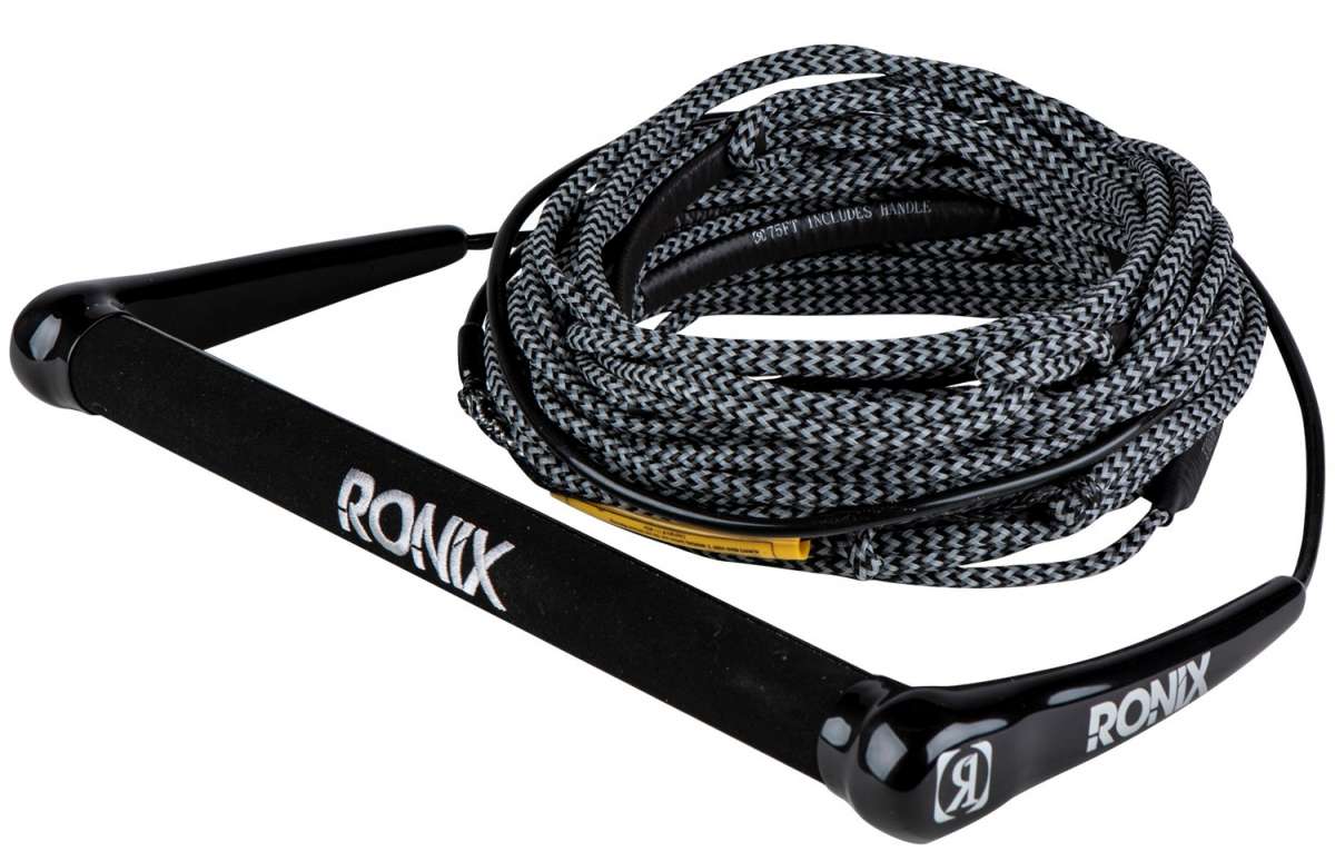 Ronix Combo 3.0 Hide Grip Wakeboard Handle With 70 ft Mainline Rope - The rope is black and white with a zig-zag pattern, coiled in the background behind the handle.
