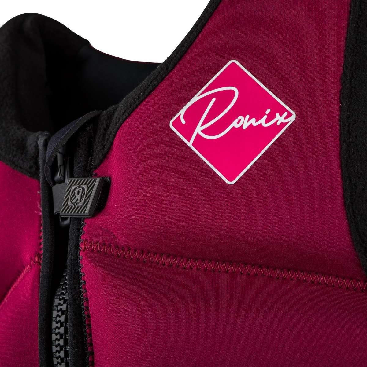 Ronix Girls Laguna CGA Wake Vest 2022 - A pink and black wake vest with a white logo on the chest.