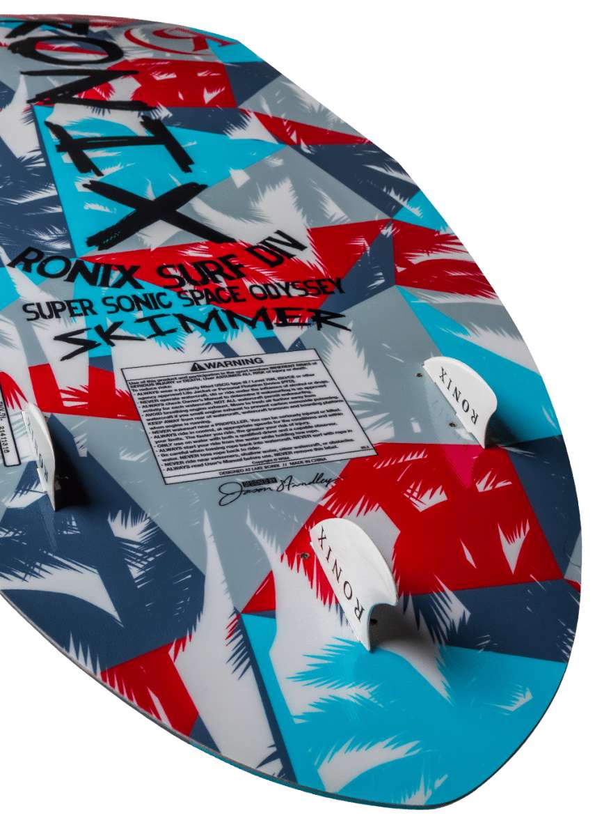 Ronix Kids Super Sonic Space Odyssey Skimmer Wakesurf Board 2022 - A blue and red wakesurf board with a space-themed design, featuring palm trees and stars.