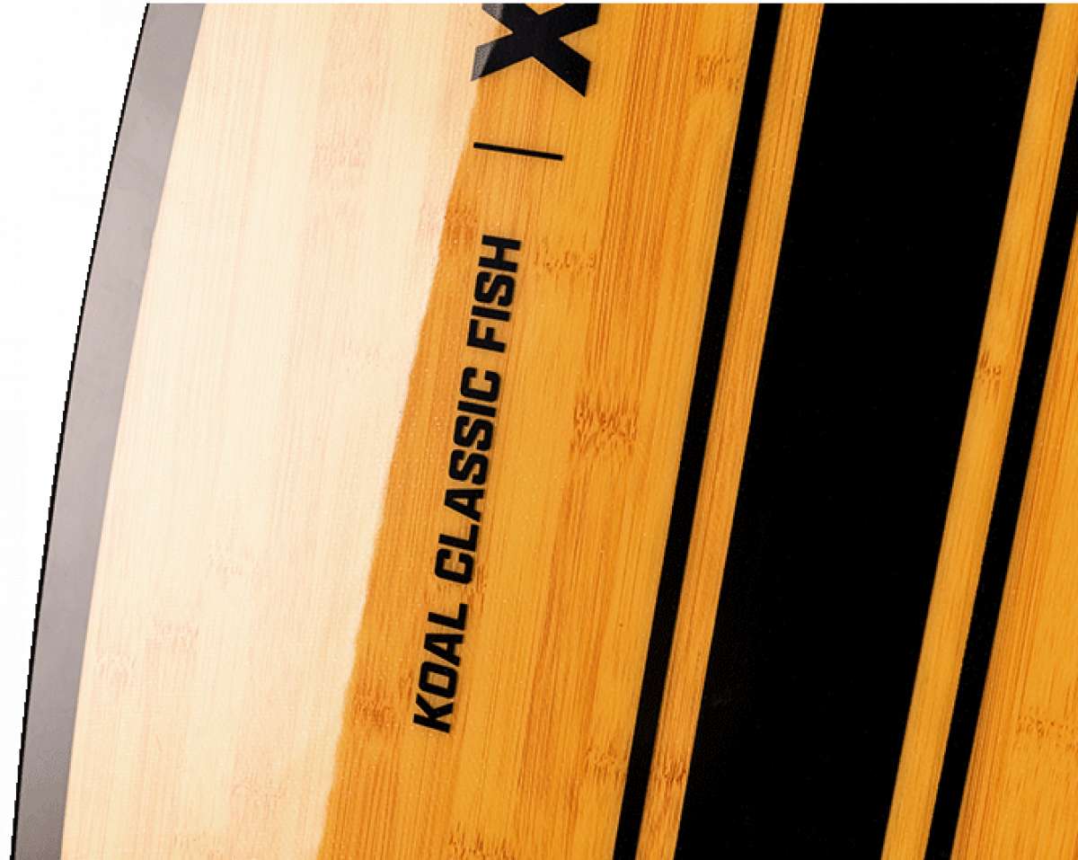 Ronix Koal Classic Fish Wakesurf Board 2023 - A light brown surfboard with a fish-shaped outline and a distinctive fin at the back.