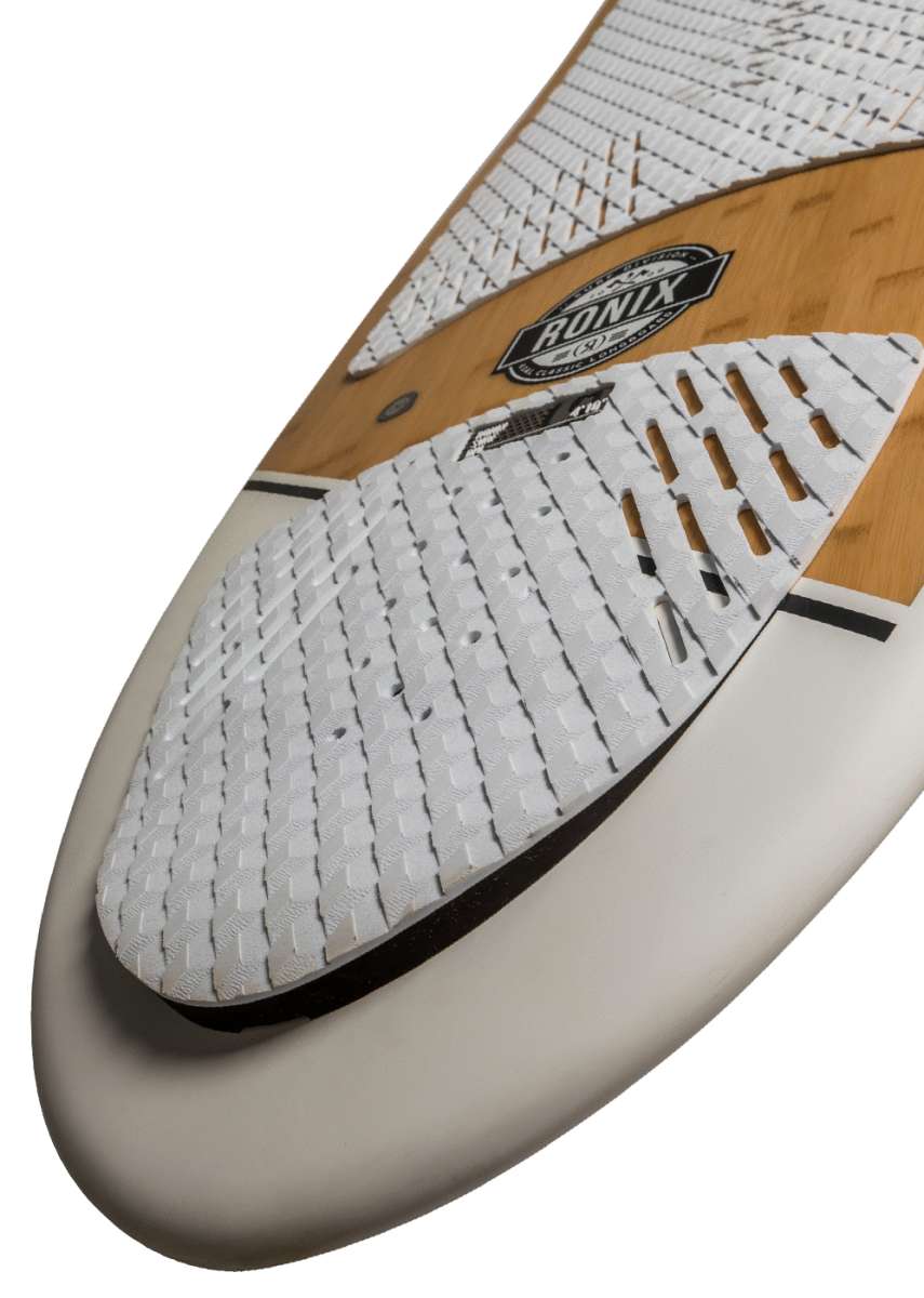 Ronix Koal Classic Longboard Wakesurf Board 2022 - A brown longboard with a black logo and white text that reads "RONIX" on top of it.