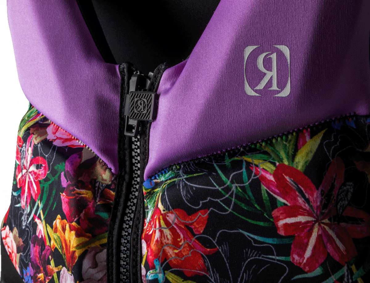 Ronix Ladies Daydream CGA Vest 2023 - A purple vest with a floral pattern on the bottom half, featuring pink and yellow flowers against a black background.
