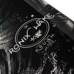 Ronix Ladies Krush Wakeboard 2022 - Black wakeboard with white and teal accents, featuring a palm tree graphic on top.