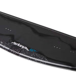 Ronix Parks Modello Wakeboard 2022 - A black wakeboard with a subtle white speckled pattern on its surface.