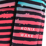 Ronix Party Impact Wake Vest 2022 - A pink wake vest with a white logo and black straps.