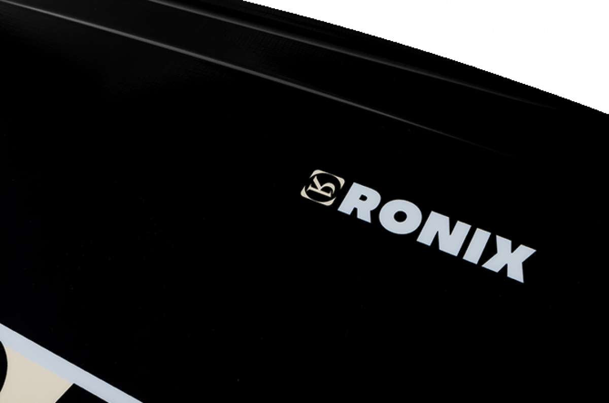 Ronix Supreme Air Core 3 Wakeboard 2023 - A black wakeboard with a white logo and lettering on top.