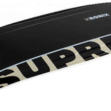 Ronix Supreme Air Core 3 Wakeboard 2023 - A black wakeboard with a white logo and text on top, featuring a tan-colored graphic along its bottom edge.