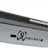 Ronix Supreme Air Core 3 Wakeboard 2023 - A white wakeboard with a black logo on its top edge and a small black square near the tip.