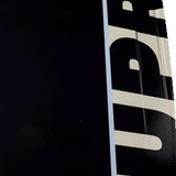 Ronix Supreme Air Core 3 Wakeboard 2023 - A black wakeboard with white lettering and a distinctive "Supreme" logo on top.