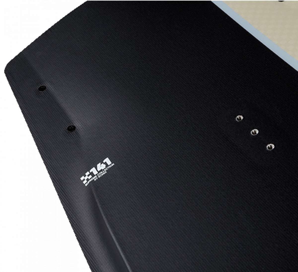 Ronix Supreme Air Core 3 Wakeboard 2023 - A black wakeboard with a textured pattern and three silver screws on its top side.