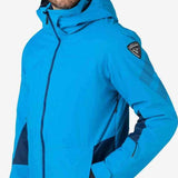 Rossignol All Speed Insulated Jacket 2022-2023 - A bright blue jacket with a black zipper and two zippered pockets on either side.