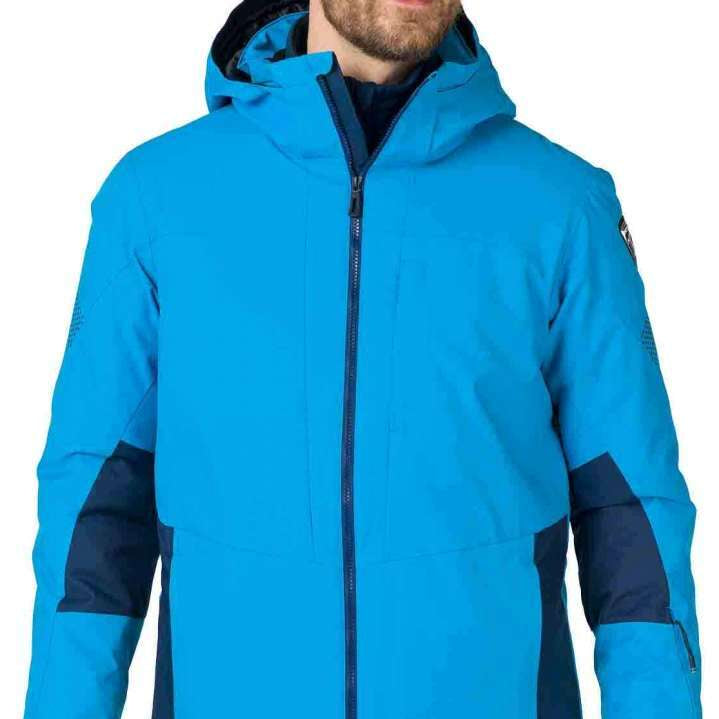 Rossignol All Speed Insulated Jacket 2022-2023 - A bright blue jacket with a black zipper and two zippered pockets on either side.
