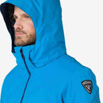 Rossignol All Speed Insulated Jacket 2022-2023 - A bright blue jacket with a black zipper and logo on the left sleeve.