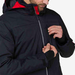Rossignol All Speed Insulated Jacket 2022-2023 - A black jacket with a red zipper and collar trim.
