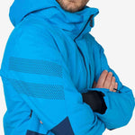 Rossignol All Speed Insulated Jacket 2022-2023 - A bright blue jacket with a hood, featuring perforated panels on the upper arms and chest.