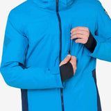 Rossignol All Speed Insulated Jacket 2022-2023 - A bright blue jacket with a black zipper and two zippered pockets on either side of the chest.