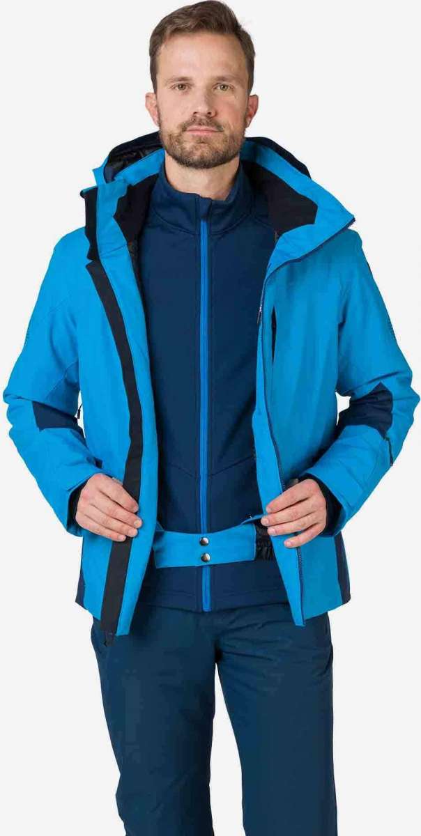 Rossignol All Speed Insulated Jacket 2022-2023 - A blue jacket with a black zipper and two zippered pockets on either side.