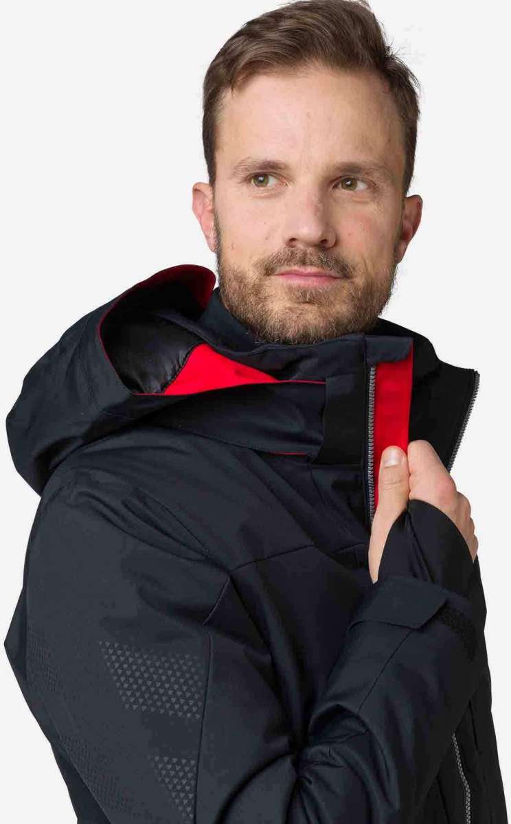 Rossignol All Speed Insulated Jacket 2022-2023 - A black jacket with red accents and a zipper down the front.