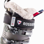 Rossignol Ladies Pure Heat GW Ski Boot 2022-2023 - A black ski boot with a white fur lining visible inside, and a red strap on the side.