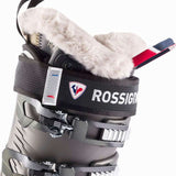 Rossignol Ladies Pure Heat GW Ski Boot 2022-2023 - A black ski boot with a white fur lining visible inside, and a red strap on the side.