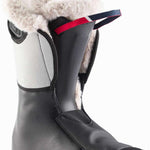 Rossignol Ladies Pure Heat GW Ski Boot 2022-2023 - A black ski boot with a white fur trim and red stripe on the top.