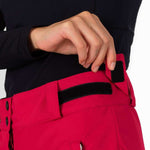 Rossignol Ladies Rapide Insulated Pant 2022-2023 - A pair of red ski pants with a black waistband and belt loops.