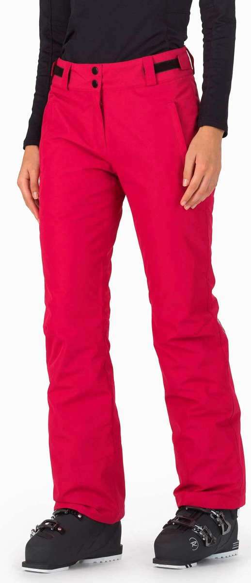 Rossignol Ladies Rapide Insulated Pant 2022-2023 - A pair of red ski pants with black buttons and a black belt loop on the waistband.