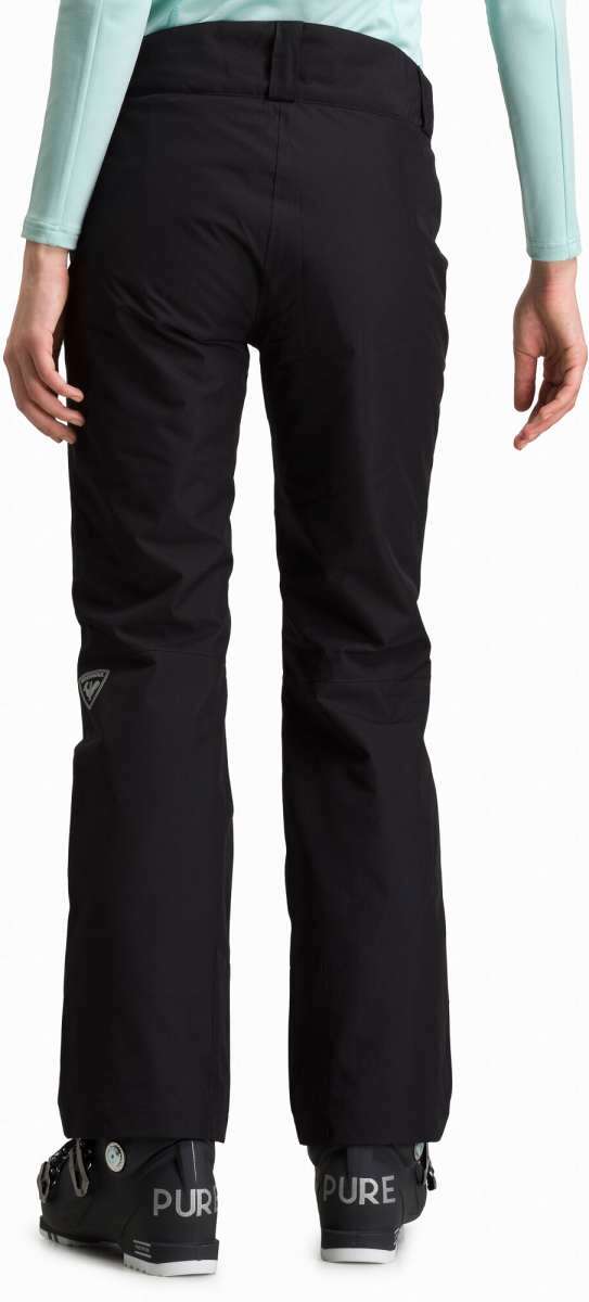Rossignol Rapide Ladies Insulated Pant 2024 - Black pants with a white logo on the left thigh and silver zippers at the ankles.