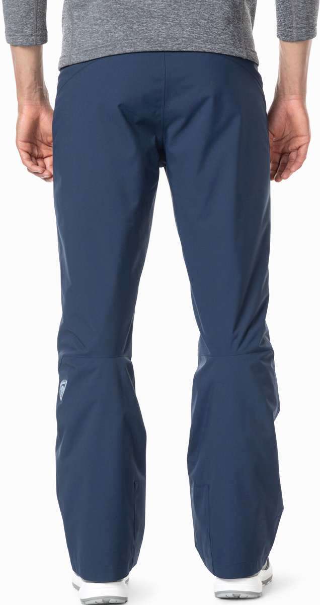 Rossignol Siz Insulated Pant 2024 - Dark blue pants with a white logo on the left leg, featuring a shiny material and a straight cut.
