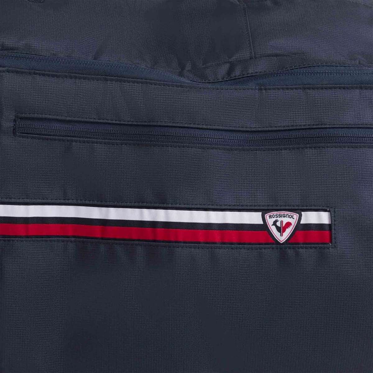 Rossignol Strato Extendable Wheely 2 Pairs Ski Bag 2024 - A navy blue ski bag with a zippered pocket on top and two wheels at the bottom.