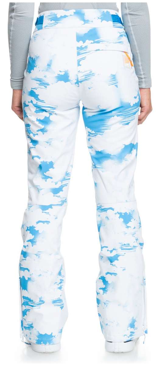 Roxy Women's Chloe Kim Insulated Pants 2024 - White snow pants with blue abstract brush stroke pattern and orange zipper pull on back pocket.