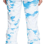 Roxy Women's Chloe Kim Insulated Pants 2024 - White snow pants with blue abstract brush stroke pattern and orange zipper pull on back pocket.