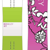 Roxy Women's Dawn Cynthia Rowley Snowboard 2024 - A pink snowboard with a white logo and black text on top, featuring a floral pattern along the bottom edge.