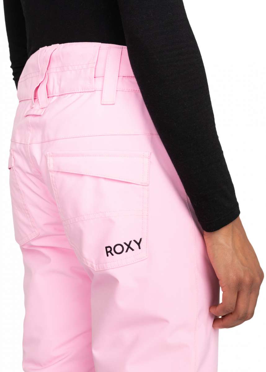 Roxy Junior's Backyard Insulated Pant 2024 - A pair of light pink snow pants with a belt and two zippered pockets on the side.