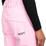 Roxy Junior's Backyard Insulated Pant 2024 - A pair of light pink snow pants with a belt and two zippered pockets on the side.