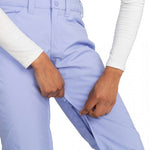 Roxy Junior's Backyard Insulated Pant 2024 - A pair of light blue snow pants with a zippered pocket on the side.
