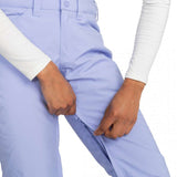 Roxy Junior's Backyard Insulated Pant 2024 - A pair of light blue snow pants with a zippered pocket on the side.