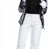 Roxy Junior's Backyard Insulated Pant 2024 - A pair of snow pants with a floral pattern in shades of purple and grey, featuring a fur-lined hood.