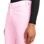 Roxy Junior's Backyard Insulated Pant 2024 - A pair of pink snow pants with a belt and two pockets on the side.