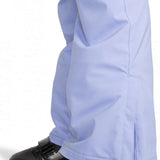 Roxy Junior's Backyard Insulated Pant 2024 - A pair of light blue snow pants with a small white logo on the left leg, featuring a zipper and snap button closure at the bottom.