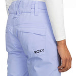 Roxy Junior's Backyard Insulated Pant 2024 - A pair of light blue snow pants with a white logo on the left thigh and a black strap at the waist.