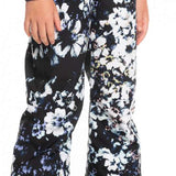 Roxy Junior's Backyard Printed Pant 2023 - Black snow pants with a white floral pattern and blue accents.