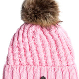 Roxy Junior's Blizzard Beanie 2024 - A pink beanie with a brown faux fur pom-pom on top.