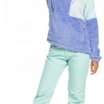 Roxy Women's Alabama 1/4 Zip Fleece 2023 - A purple and mint green fleece zip-up sweater with a white zipper, worn by a model posing with her left arm raised.