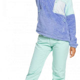 Roxy Women's Alabama 1/4 Zip Fleece 2023 - A purple and mint green fleece zip-up sweater with a white zipper, worn by a model posing with her left arm raised.