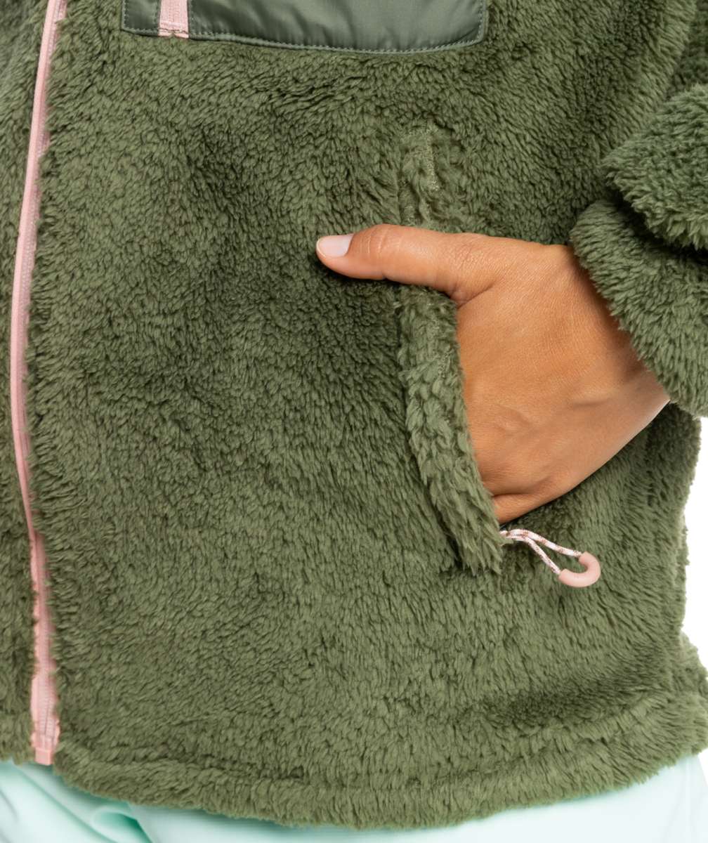Roxy Women's Alabama Full Zip Jacket 2023 - A green fleece jacket with a zippered front and two pockets on either side, featuring a small pocket on the upper chest area.