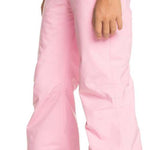 Roxy Women's Backyard Insulated Pant 2024 - A pair of pink snow pants with a white logo on the left leg, featuring a belt loop and two pockets on the back.